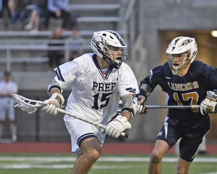 Prep lax squad handles MC, climbs over .500